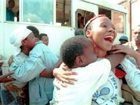 A Rwandan woman reunited with her brother.